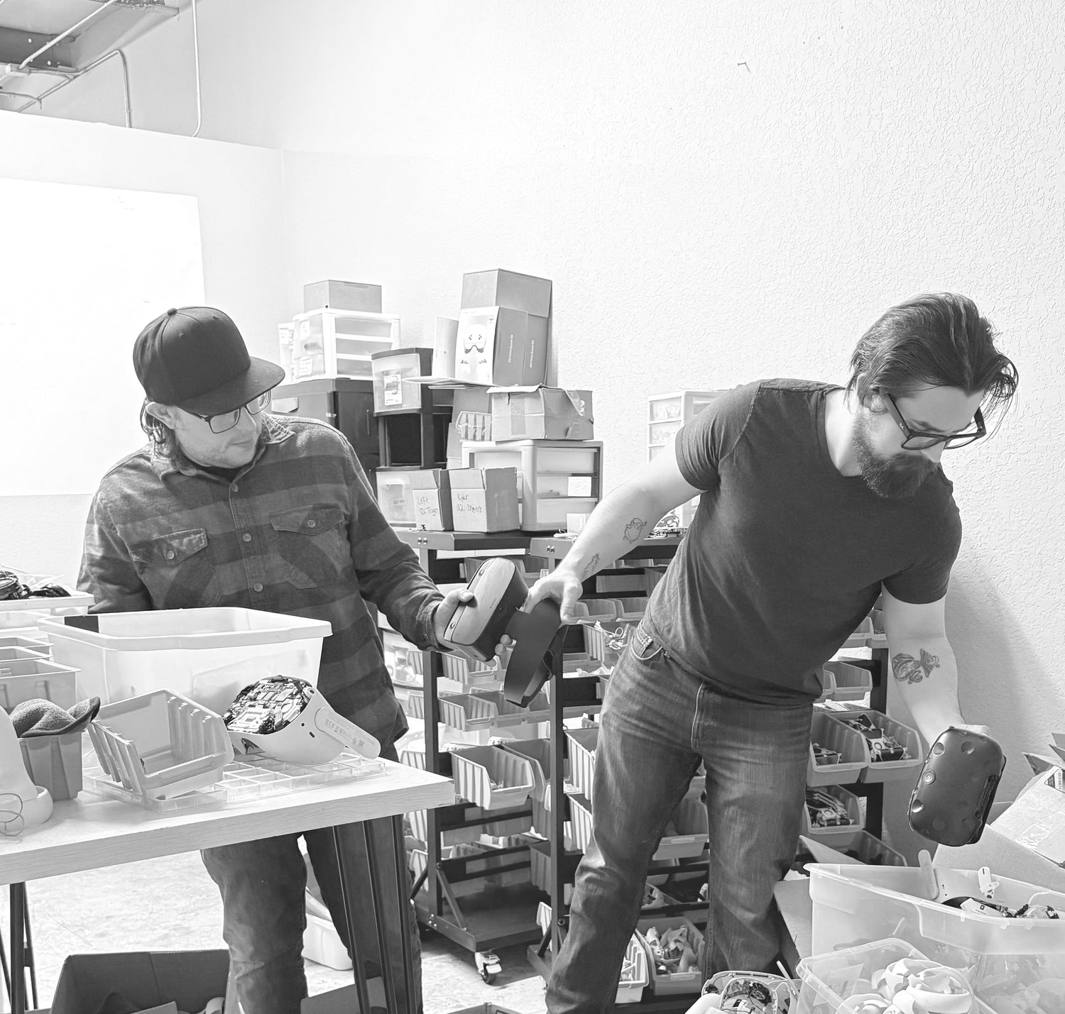 Dan and Preston, founders of Fix My Oculus, in their VR repair workshop